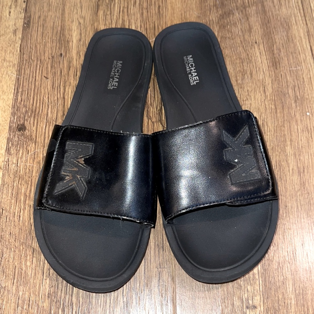 Michael Kora Black Slides
